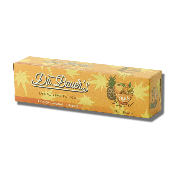 Dr. Bauers Zahnpasta Fruits of Love Fruit Splash 90 ml bietet eine sanfte Reinigung und leuchtende Pfirsich-, Ananas- und Orangen-Illustrationen auf der Verpackung.