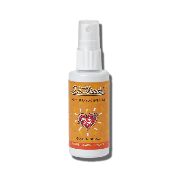 Eine kompakte 50-ml-Sprühflasche mit der Aufschrift „Dr. Bauer’s Golden Dream Mundspray“ bietet zitronige Frische und antibakterielle Wirkung.