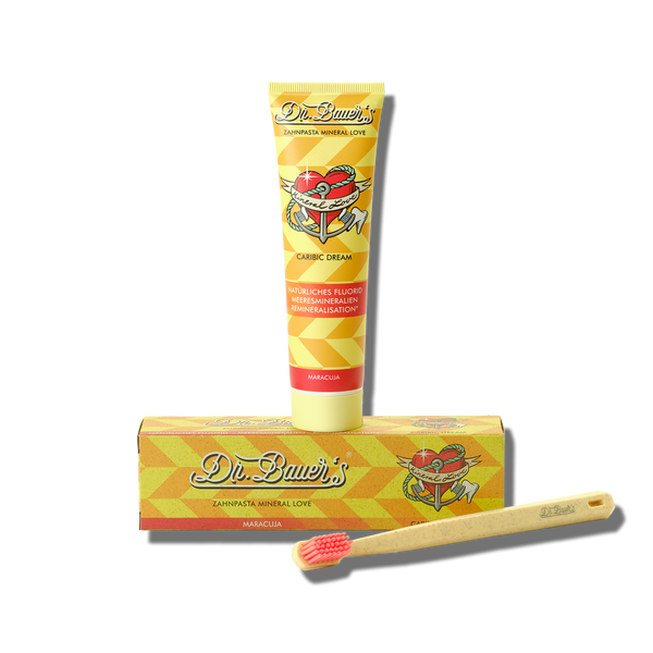 Dr. Bauer's Zahnpasta Mineral Love Caribic Dream 90ml samt Box und Bambuszahnbürste mit roten Borsten-perfekt für empfindliche Zähne und angereichert mit Meeresmineralien.