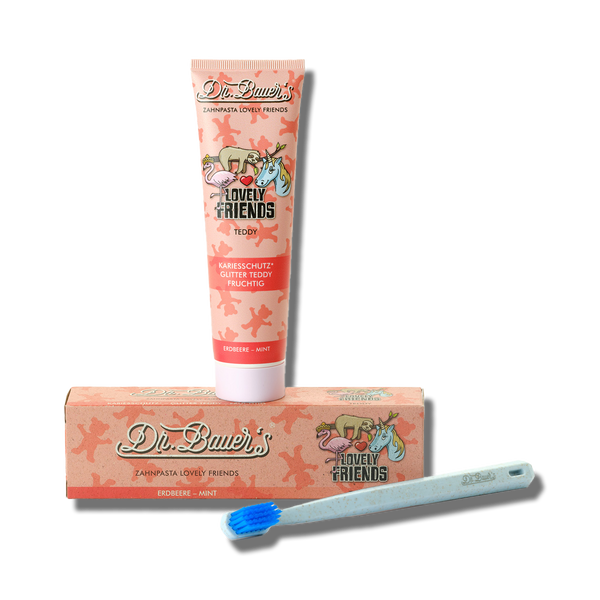Eine 90-ml-Tube Dr. Bauer's Zahnpasta Lovely Friends mit Teddy-, Erdbeer- und Minze-Geschmack und Xylitol, mit bezaubernden Tierillustrationen auf der Vorderseite.