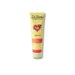Dr. Bauer's Zahnpasta Active Love Cherry Lady 90ml in einer gelben Tube wird vor einem schwarzen Hintergrund dargestellt.