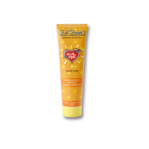 Eine gelbe Tube Dr. Bauer's Zahnpasta Active Love Exotic Love 90ml mit orangen und roten Akzenten auf Schwarz, die einen Hauch von tropischer Zahnpflege in Ihre tägliche Routine bringt.
