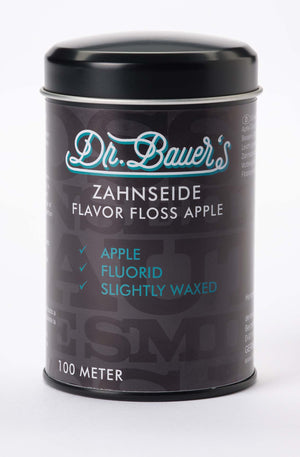 Schwarze Dose von Dr. Bauer's ZS-SPENDER Flavor Floss Apple 100m, etikettiert und mit Apfelgeschmack, mit grünen Häkchen.