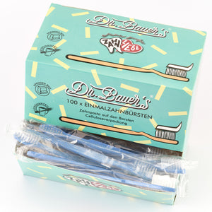 Box mit 100 Dr. Bauer's Einmalzahnbürsten -STROH- in blauer Verpackung, einzeln verpackt und mit integrierter Zahnpasta.