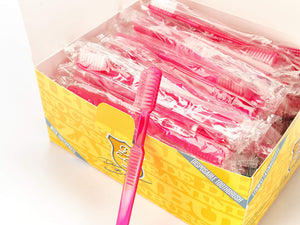 Eine Schachtel Dr. Bauer's Einmalzahnbürsten mit Zahnpasta 100er Packung PINK, jede Zahnbürste einzeln verpackt, eine davon ist auf der Vorderseite abgebildet.