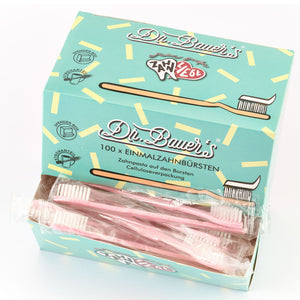 Schachtel Dr. Bauer's Einmalzahnbürsten -STROH- 100er Rot, mit mehreren einzeln verpackten Zahnbürsten von Dr. Bauer's sichtbar.