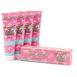 Vier Tuben Dr. Bauer's Zahnpasta Lovely Friends Einhorn 90ml, 4er Pack, mit Einhörnern und Lovely Friends Branding auf der Verpackung.