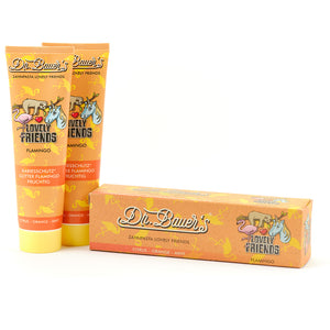 Zwei Tuben Dr. Bauer's Zahnpasta Lovely Friends Flamingo 90ml (2er Pack) mit bunten Tierillustrationen auf der Verpackung. Es gelten nur CSS-Stile - keine SEO-Keywords sind in dieser charmanten Beschreibung enthalten.