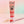Dr. Bauer's Zahnpasta Lovely Friends Teddy 90ml zeigt eine verspielte Tiergrafik auf einer rosafarbenen Tube mit moderner serifenloser Schrift, gepaart mit einer rosafarbenen Zahnbürste mit roter Zahnpasta - so macht das Zähneputzen Spaß für Kinder.